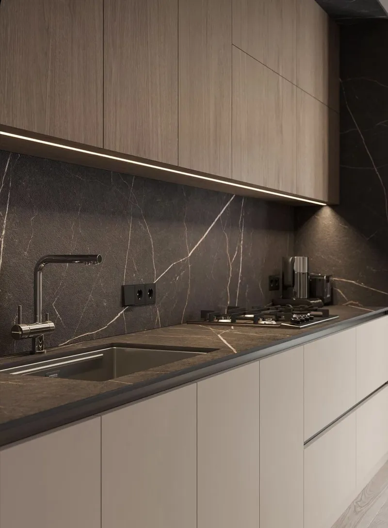 Custom kitchen with dark marble backsplash