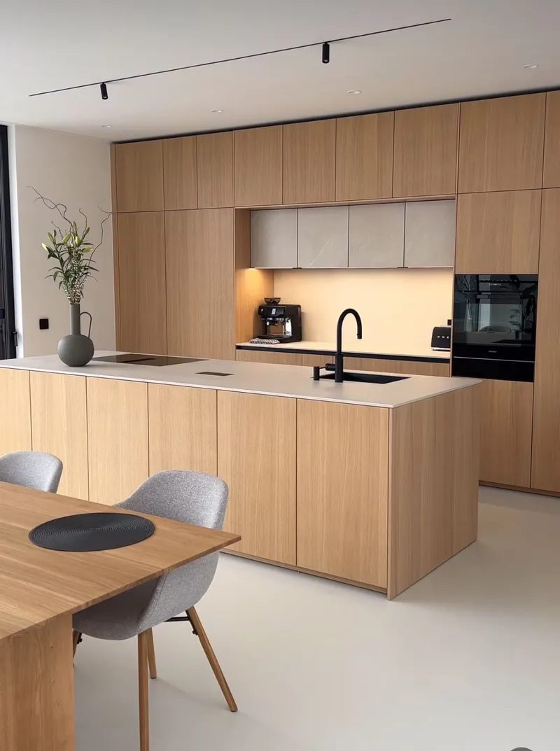 Bespoke oak kitchen with island and integrated appliances