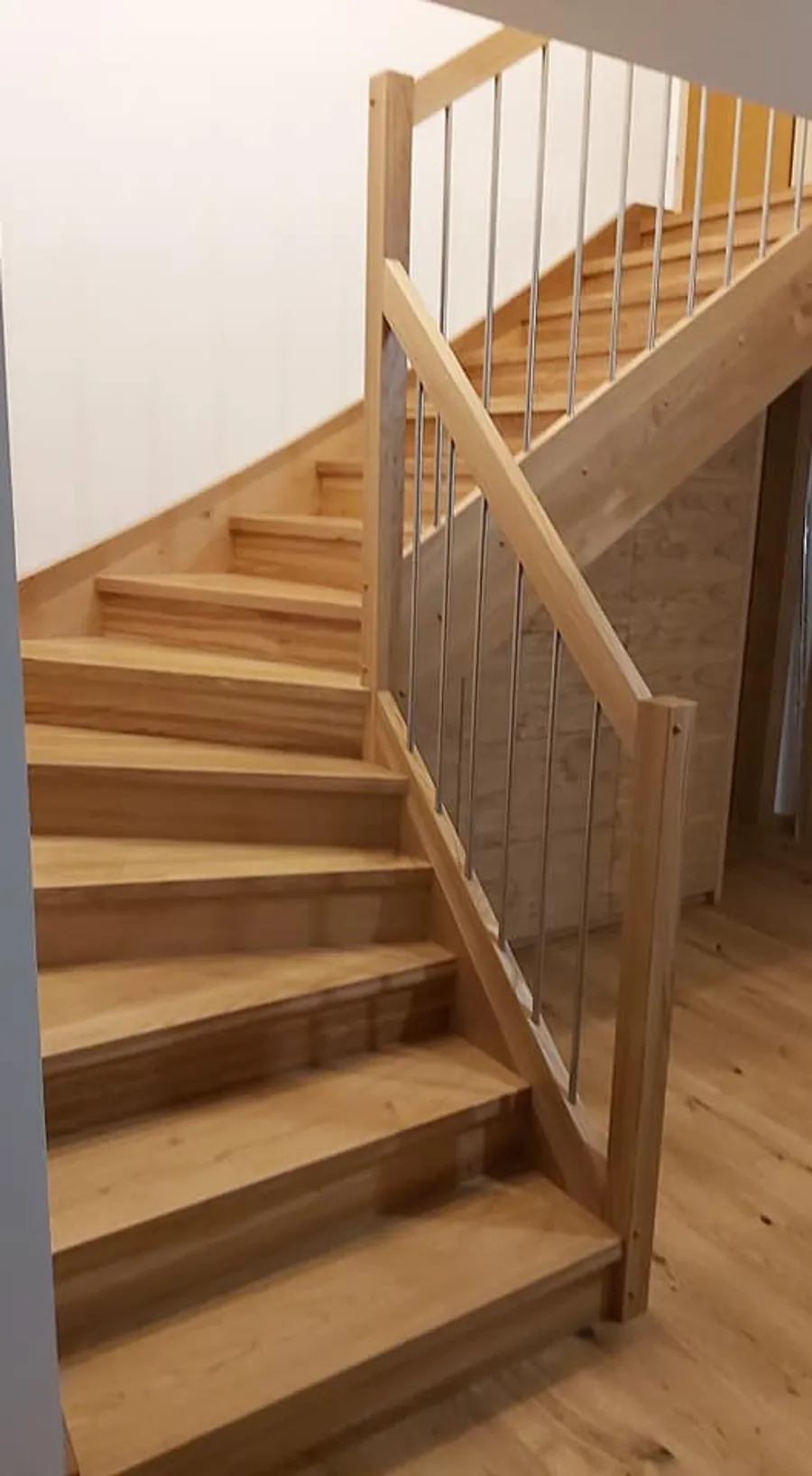 Custom wooden staircase with railing